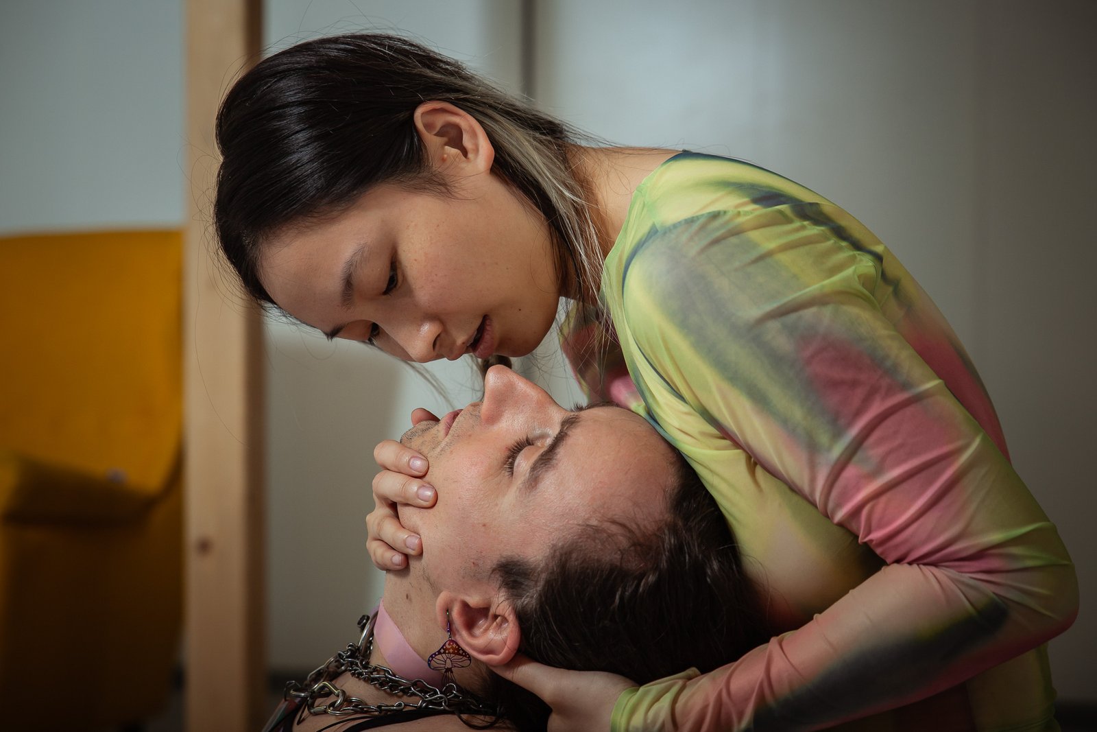 Close embrace of two people indoors