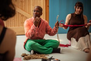 People practicing rope skills in a workshop