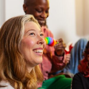 People laughing and enjoying together indoors.