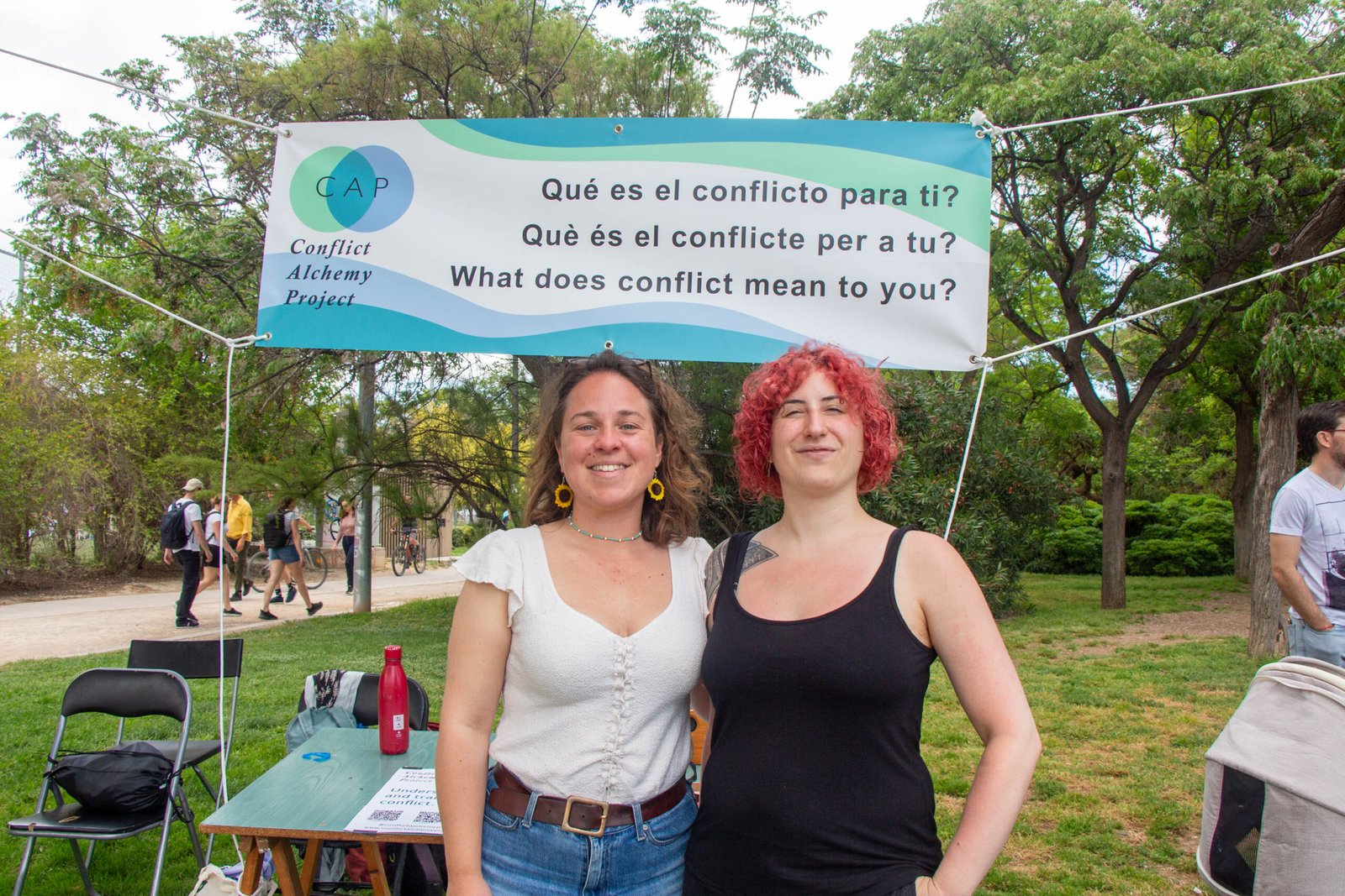 Two people under a conflict discussion banner